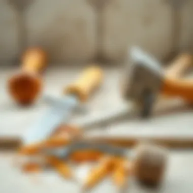 Tools required for tile removal including a chisel and hammer