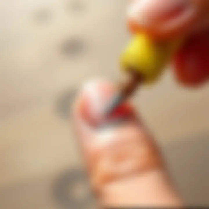 Demonstration of adhesive removal on nails